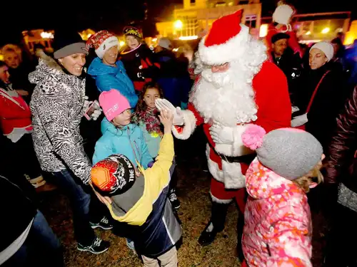 Santa arrives at the Singing With Santa event in downtown Durango